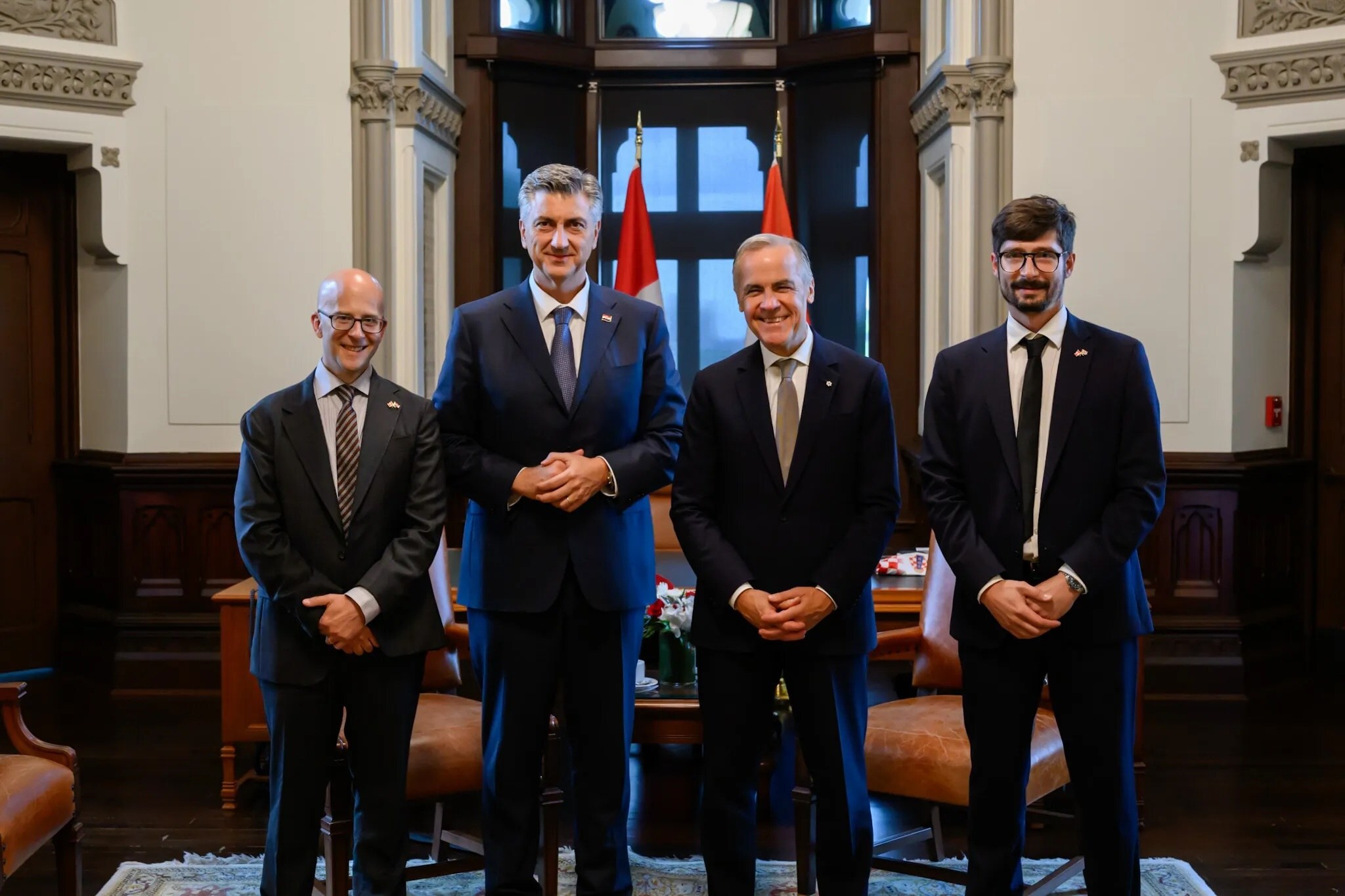 From left to right: Kevin Toderel, CEO of Remote Robotic Systems, Andrej Plenković, Prime Minister of Croatia, Mark Carney, Prime Minister of Canada, and Ivan Jelusic, Co-Founder of Orqa.